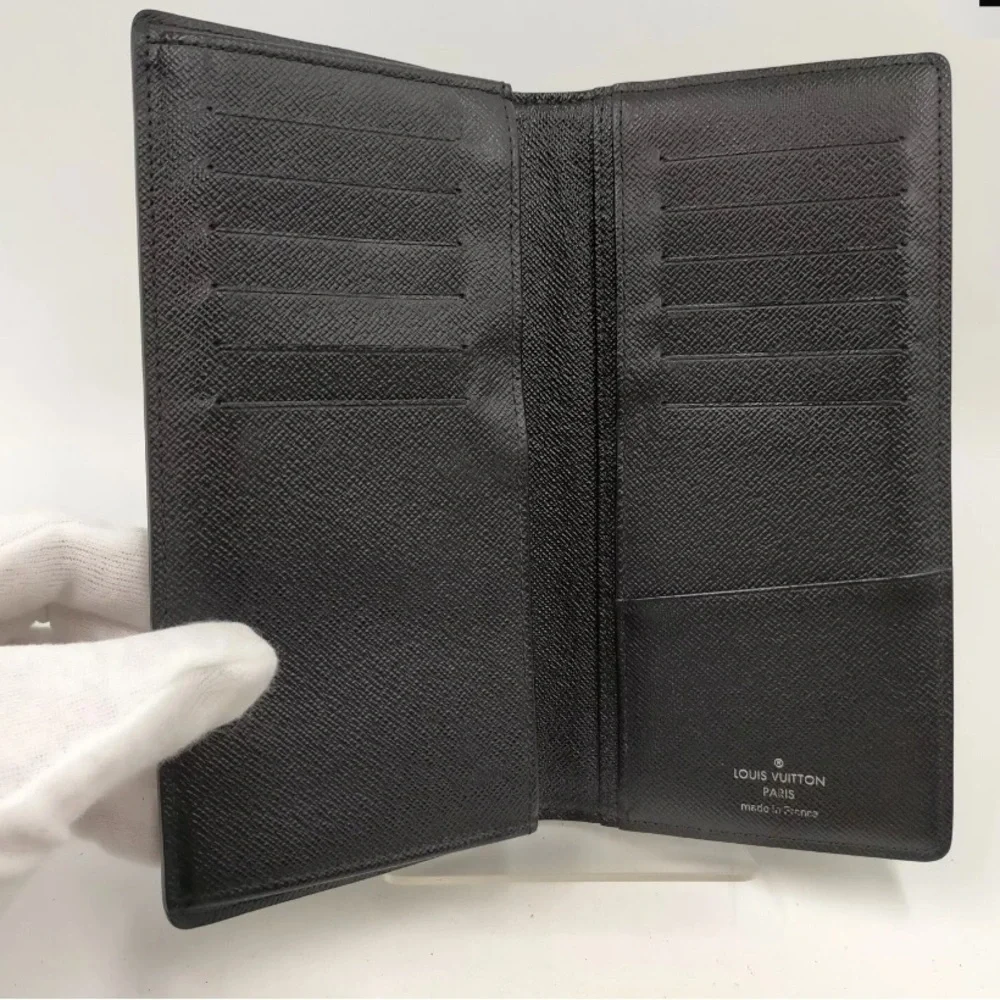 Louis Vuttton Damier Graphite wallet.